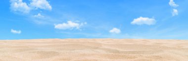 Summer Vacation and Travel Holiday Concept : Tropical beautiful view of sand beach and blurred blue sky in background. (Selective focus)