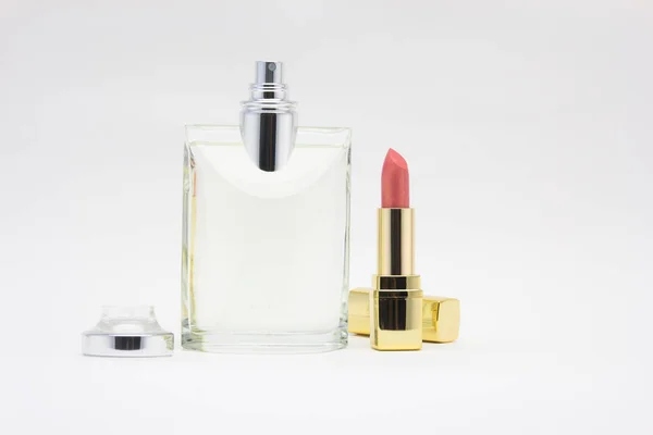 Flakon perfum z różowa szminka — Zdjęcie stockowe