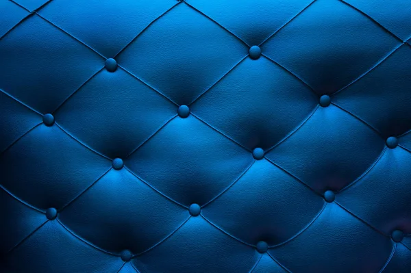 Textura de couro azul no sofá com botões — Fotografia de Stock