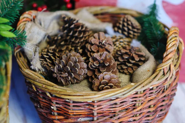 Pine cones in a basket. Christmas Decor — Stock Photo, Image