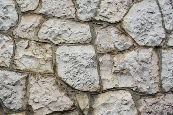 Texture of the walls with wild stone for background — Stock Photo, Image