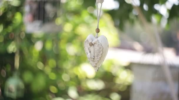 White decorative heart for decoration for a wedding — Stock Video