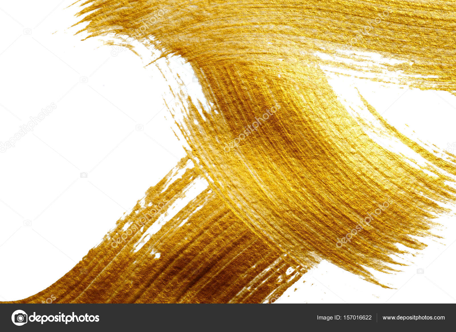 Goresan emas abstrak dengan kuas  cat  akrilik pada latar 