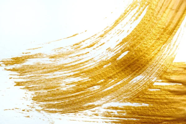 Astratto colpo d'oro con pennello acrilico su sfondo bianco e posto per il testo — Foto Stock
