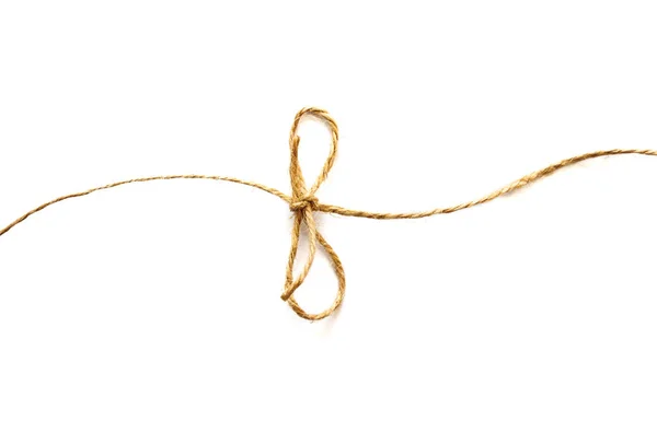 Flax rope with bow on white background — Stock Photo, Image