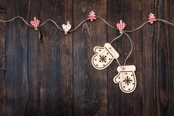 Textura de madera oscura y manoplas de Navidad y lugar para texto — Foto de Stock