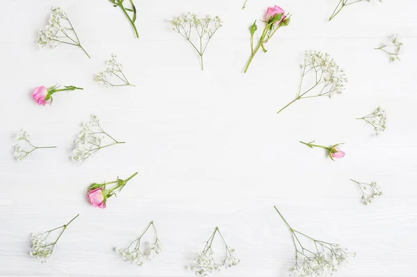 Mock up Composition of white and pink flowers rustic style, for St. Valentines Day with a place for your text. Flat lay, top view photo mock up