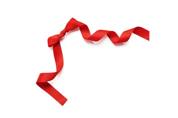 Närbild av en red ribbon bow isolerade urklippsmask på vit bakgrund, ovanifrån — Stockfoto