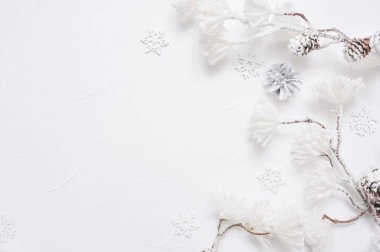 White Christmas border with cones, snowflakes and snown flowers. Xmas Wreath decoration with place for your text clipart