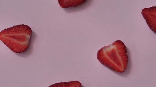 Strawberry background motion design video. Bio slice fruit berries. color texture close up. 4k 3840x2160 — Stok video