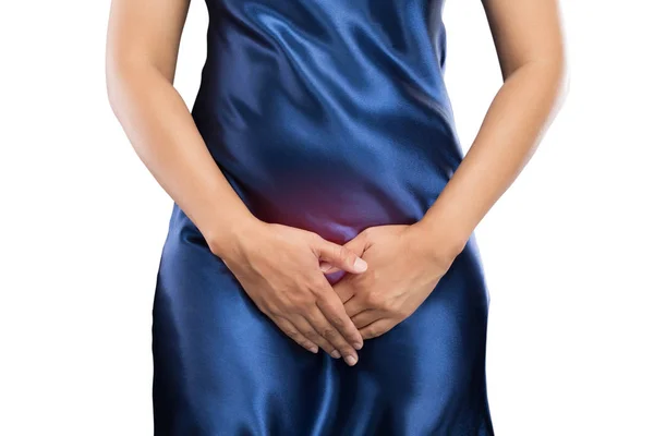 Woman with hands holding pressing her crotch lower abdomen — Stock Photo, Image