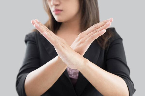 woman in black suit showing her denial with no on her hand