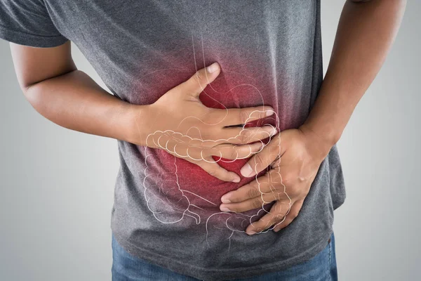 The photo of large intestine is on the man's body — Stock Photo, Image