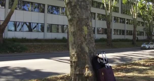 Unknown Tourist Bag Laying Bus Stop Karlsruhe Germany — Stock Video