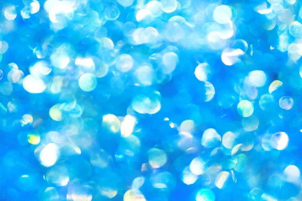 Garland with unfocused balls for Christmas. Blue garland with blurred focus. — Stock Photo, Image