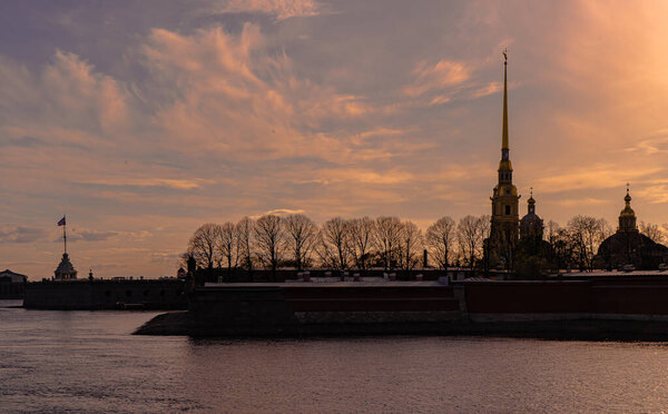 Russia, Saint Petersburg. Peter and Paul fortress and the Neva river at sunset in Saint Petersburg. Urban landscape.