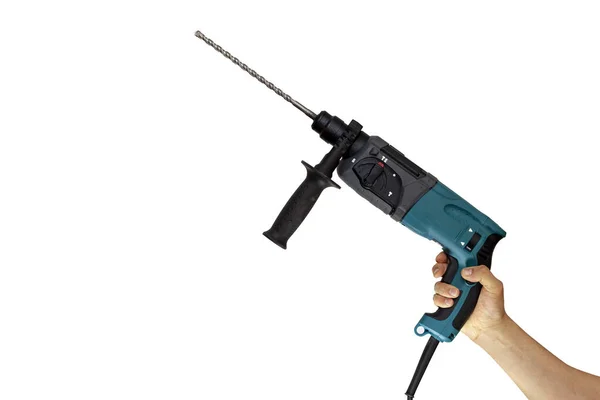 Holds the professional rotary hammer with a drill on white background. drill hammer in hand on a white background
