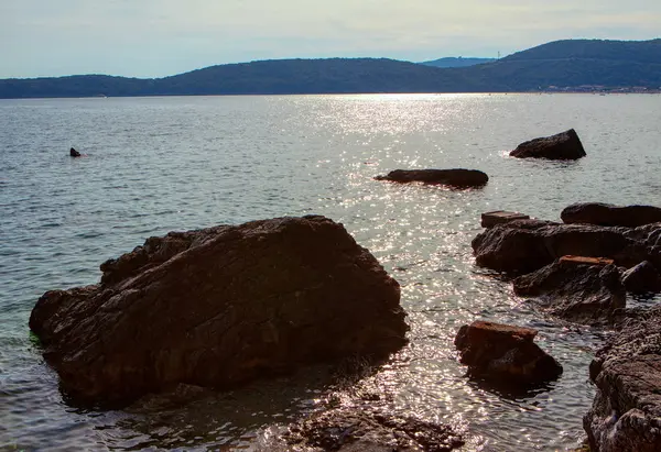 big natural rocks in the sea water 