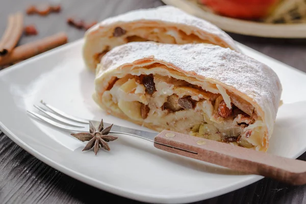 German strudel with apples,strudel with almonds and apples and raisins,home-made strudel,homemade baking,traditional strudel
