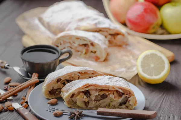German strudel with apples,strudel with almonds and apples and raisins,home-made strudel,homemade baking,traditional strudel