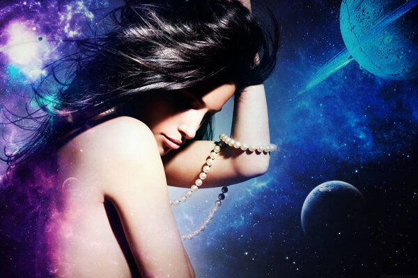 Beautiful woman portrait on space theme background