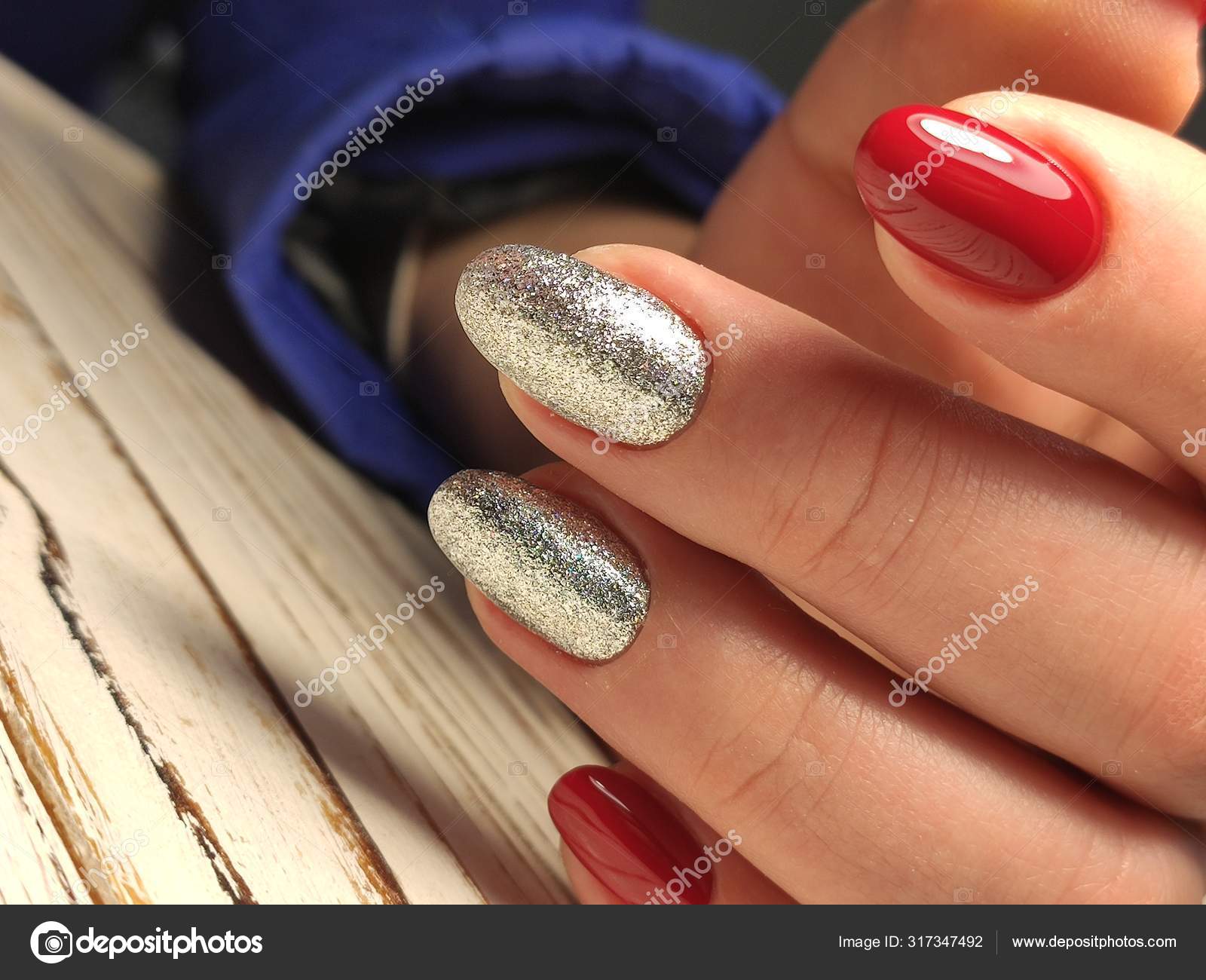 Beautiful nail design on female hands on background. Stock Photo by  © 317347492