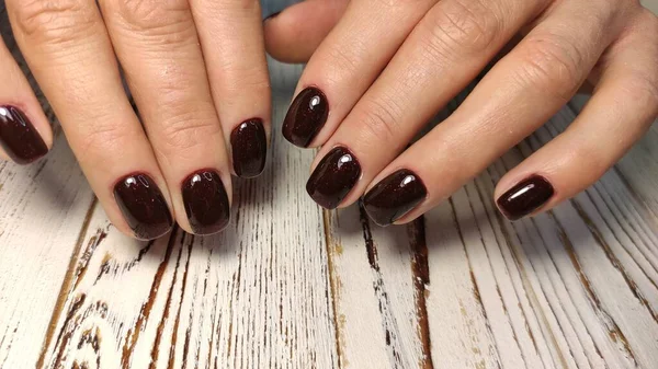 Fashionable beige manicure with a silver design — Stock Photo, Image