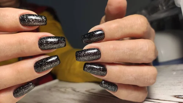 Fashionable beige manicure with a silver design — Stock Photo, Image