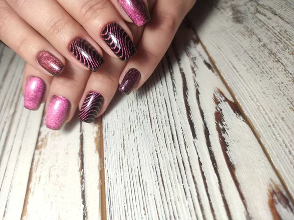 Sexy pink manicure on long beautiful nails — Stock Photo, Image