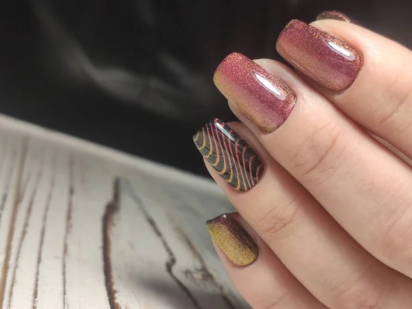 Beautiful woman's nails with beautiful christmas manicure — Stock Photo, Image