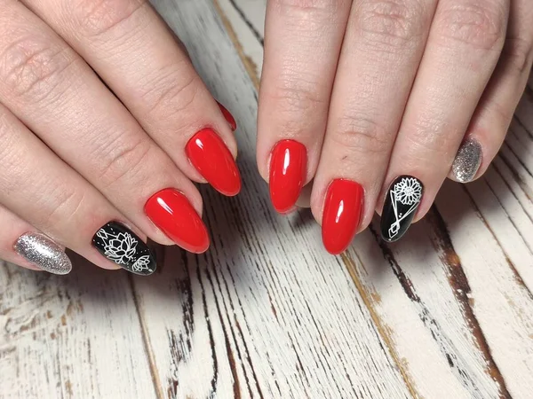 beautiful nail art manicure on the background of a fashionable texture
