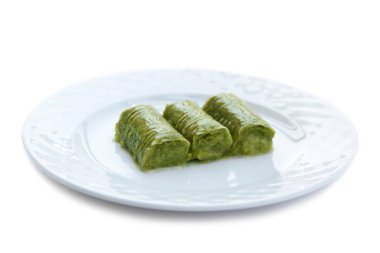 Lezzetli Türk tatlısı, ( Sarma ) sarılmış yeşil antep fıstığı ( Sarma )