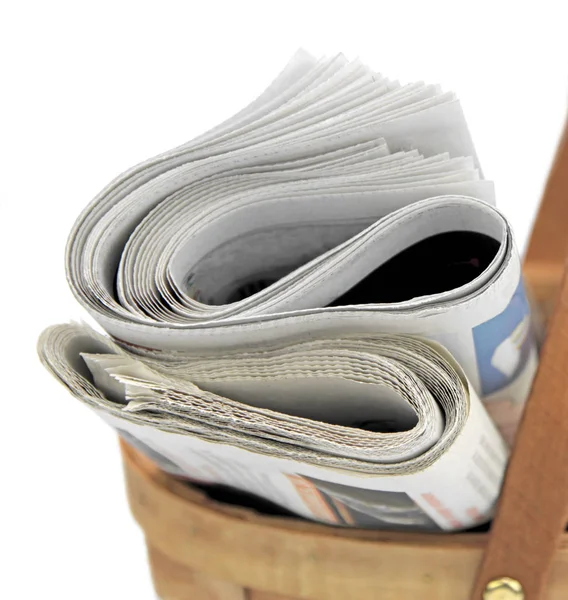 Newspapers in basket — Stock Photo, Image