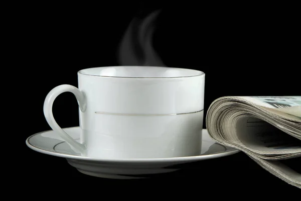 Hot coffee and newspaper — Stock Photo, Image