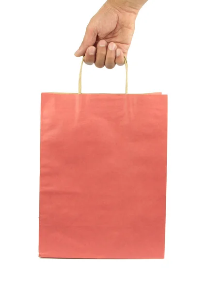Ręką człowieka niesie ze sobą torbę na zakupy — Zdjęcie stockowe