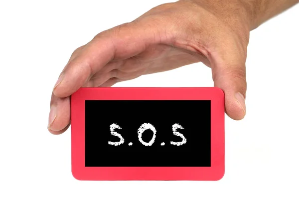 Mano sosteniendo y mostrando una tarjeta con texto "S.O.S". — Foto de Stock