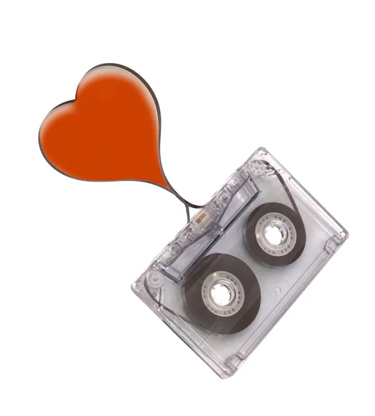 Аудиокассета и форма сердца с лентой — стоковое фото