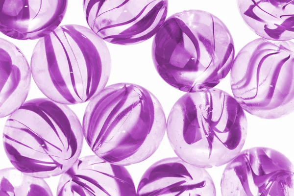 Purple glass marbles — Stock Photo, Image