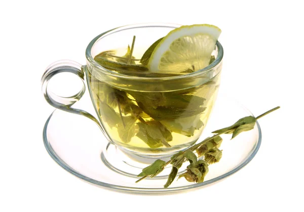 Chá de ervas, folhas de sálvia e fatia de limão — Fotografia de Stock