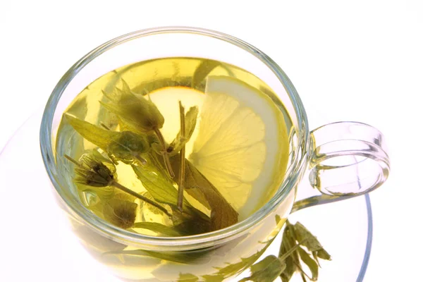 Herbal tea, sage leaves and lemon slice — Stock Photo, Image