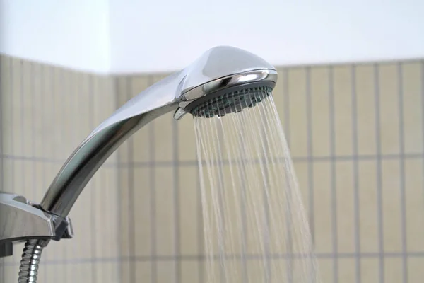 Shower head while running water — Stock Photo, Image