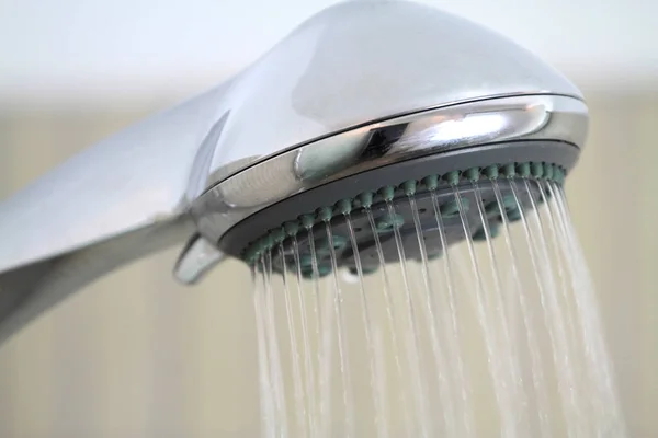 Shower head while running water — Stock Photo, Image