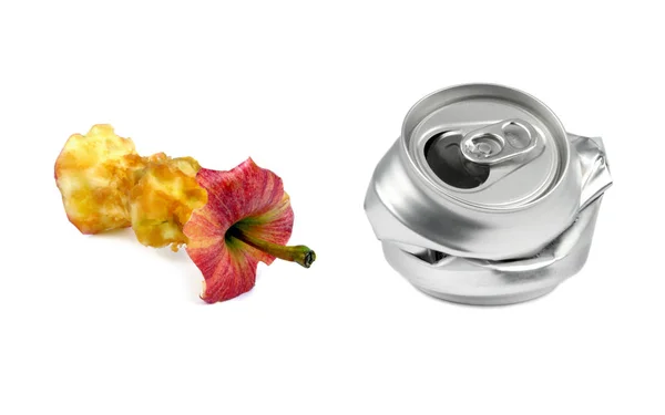 Garbage. Bitten apple and crushed drink can — Stock Photo, Image