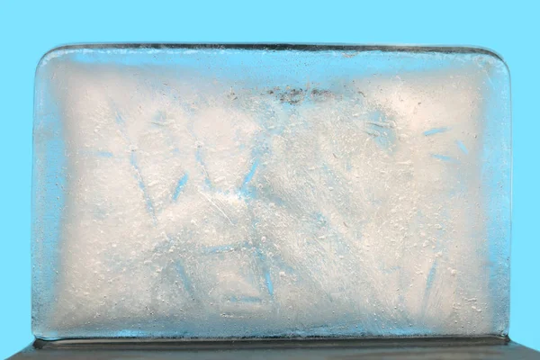 Ice texture on blue background. — Stock Photo, Image