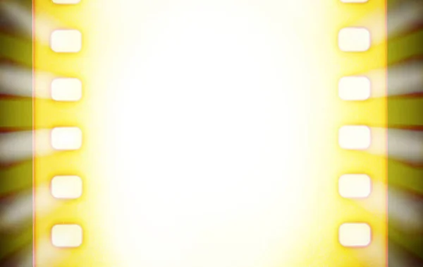 Tiras de filme e raios de luz — Fotografia de Stock