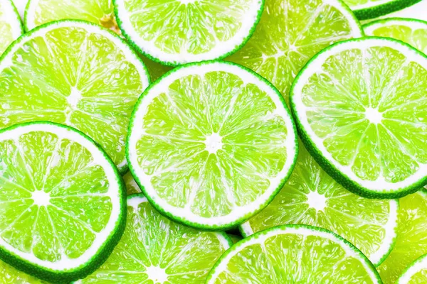 narenciye-meyve kireç dilimleri ile yeşil arka plan