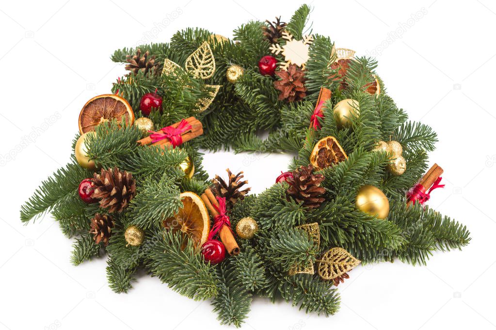 Christmas arrangement of natural fir branches. Stacked circle on a white background. Christmas wreath