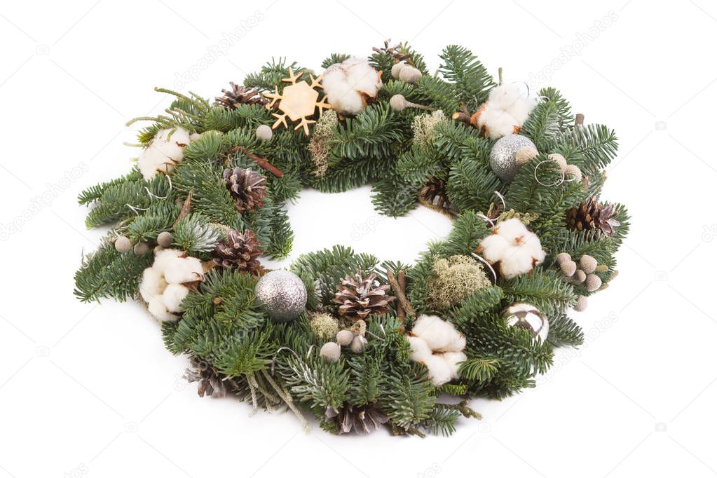 Christmas arrangement of natural fir branches. Stacked circle on a white background. Christmas wreath