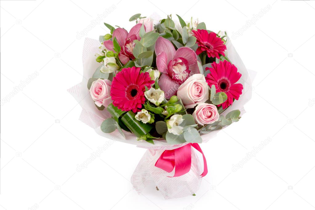 Bright buketny composition from fresh flowers, the white isolated background