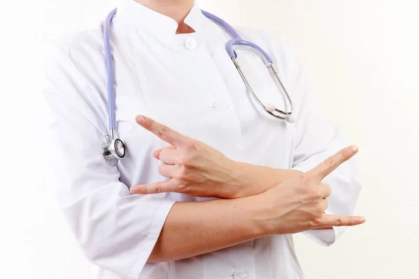 Doctor in white coat over white background shows pollen the litt — Stock Photo, Image